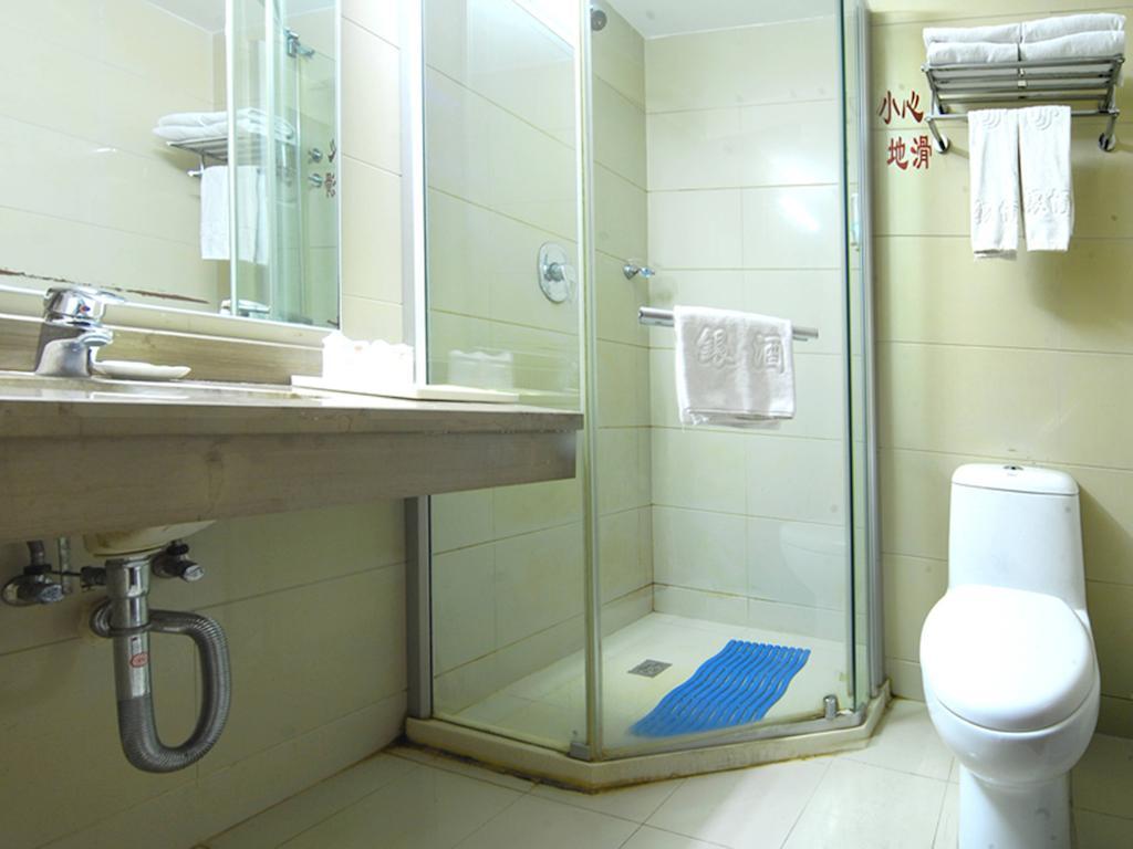 Tangyin Hotel Talien Szoba fotó